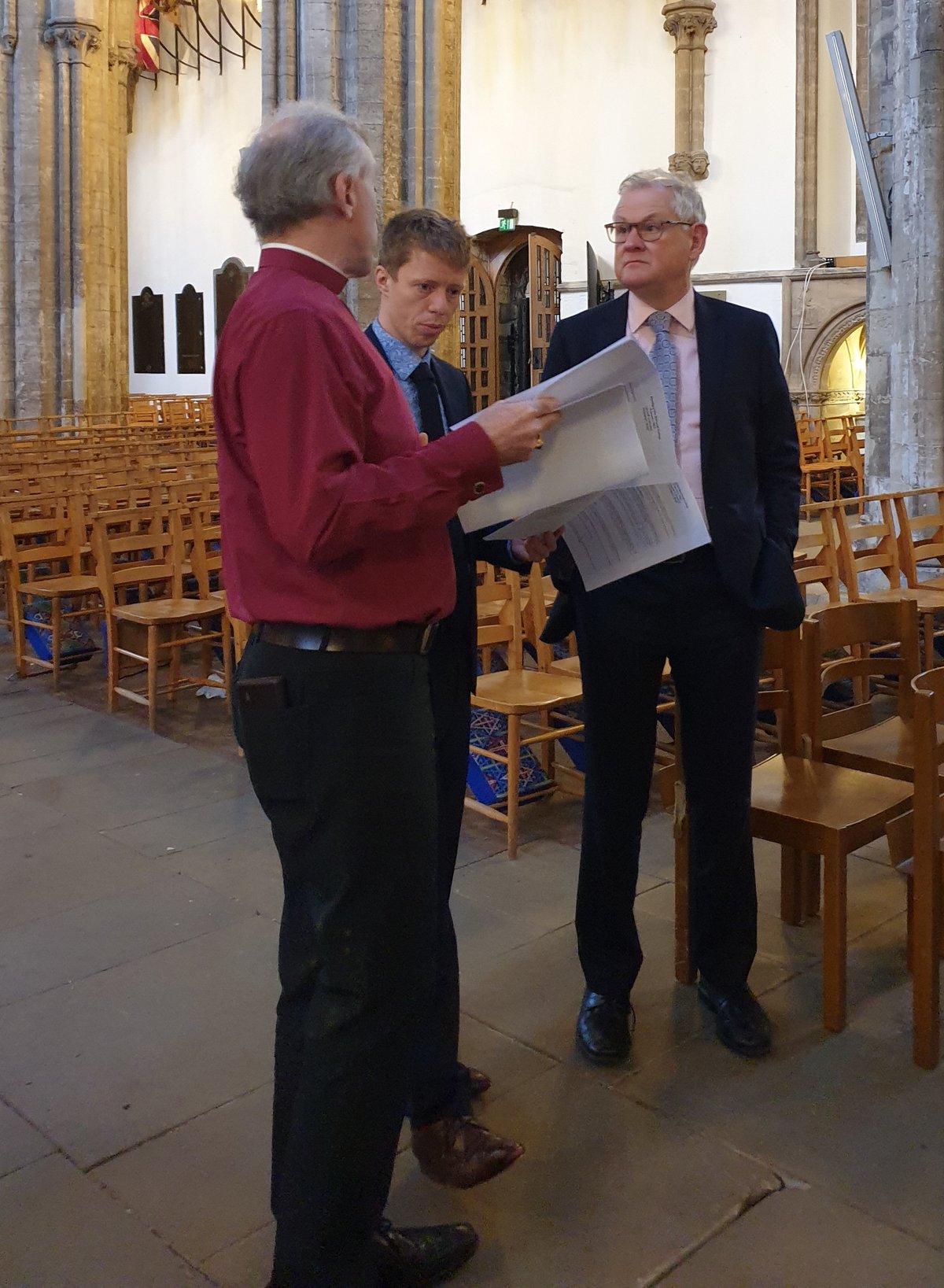 Archbishop of Wales in Llandaff Cathedral chatting to two men