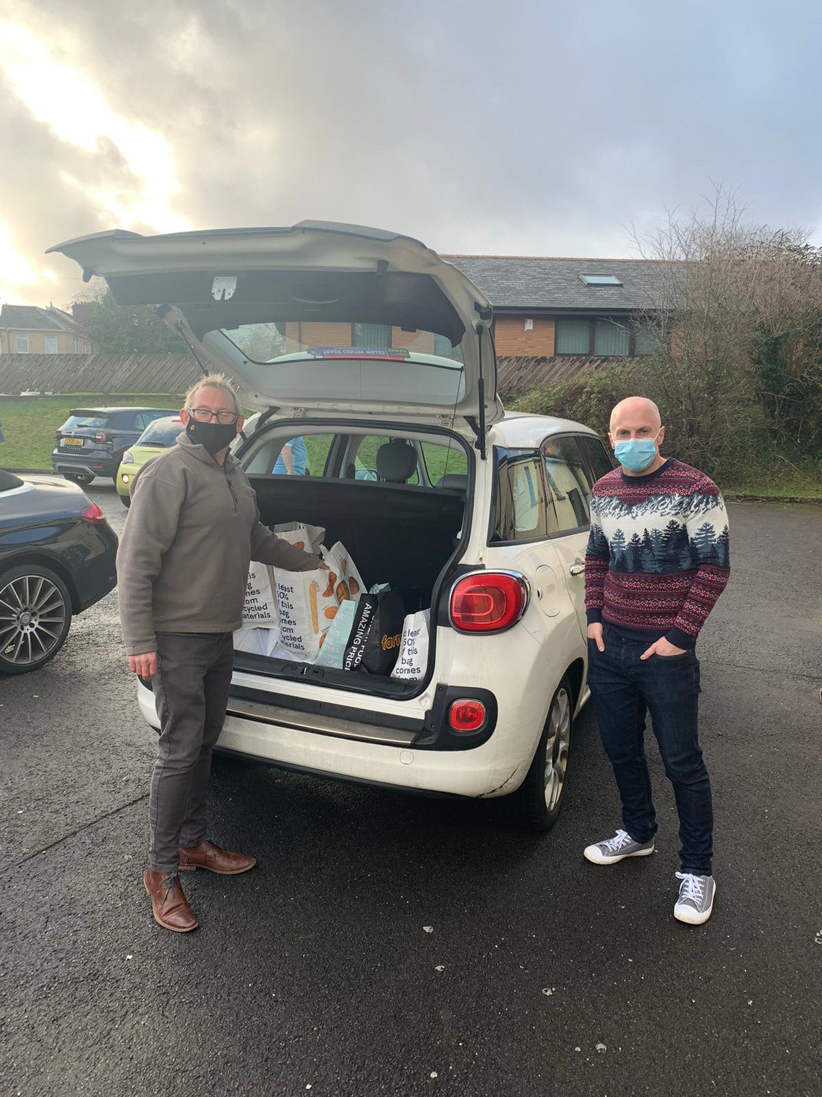 Fr Richard Green on his way to deliver the bags of joy