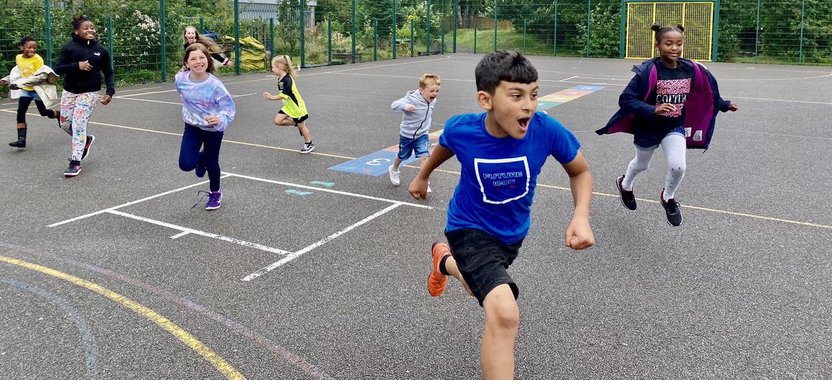 Children in a playground at St Paul's Primary School