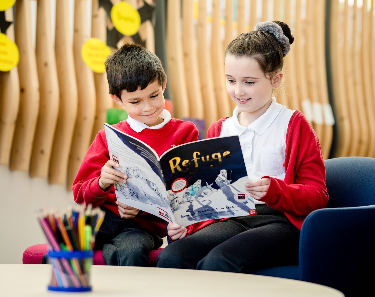 Children reading the book Refuge