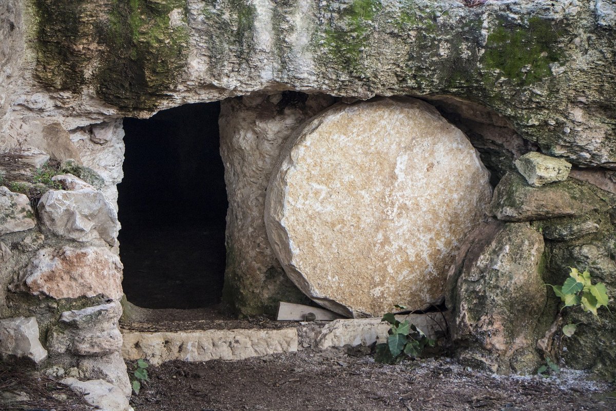 Entrance to a tomb with the stone rolled away