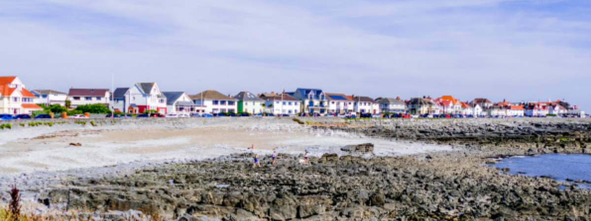 porthcawl sea front. colourful houses. rocky beach